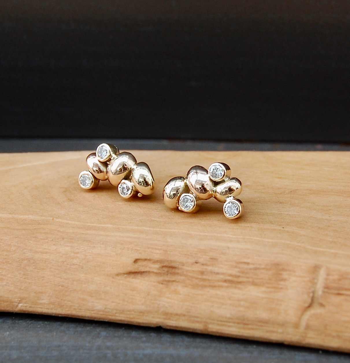 6 x 3mm diamonds set in gold cups clustered with solid gold nuggets